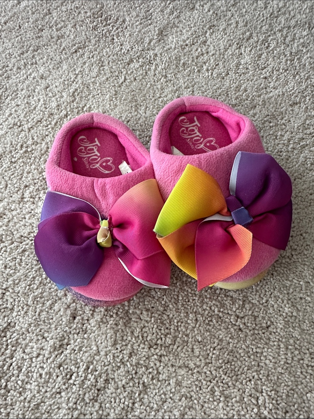 Gently used JoJo Siwa Pink Slippers with Rainbow Gradient Bows